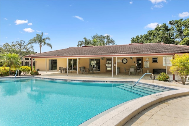 view of pool with a patio area