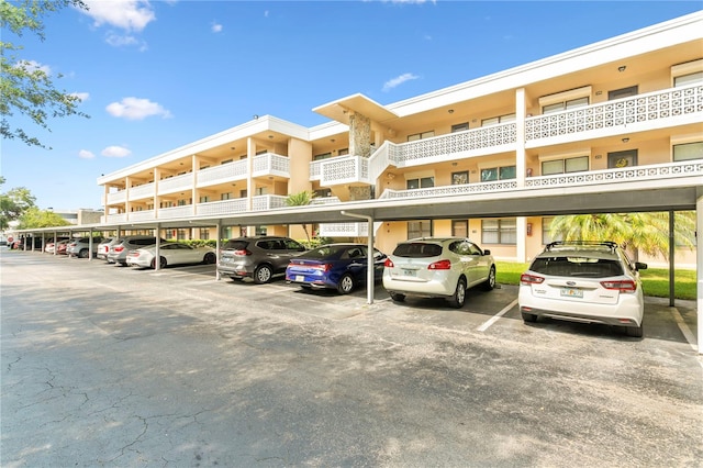 exterior space with a carport