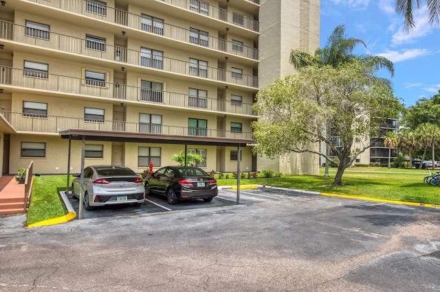 view of building exterior with a carport