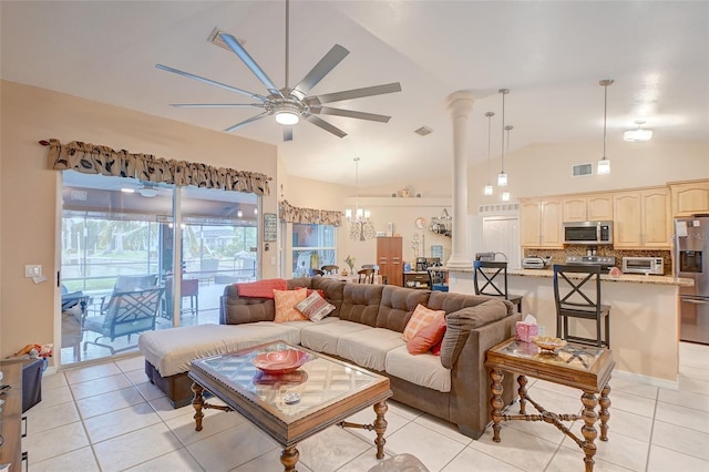 living room featuring high vaulted ceiling, ceiling fan with notable chandelier, and light tile floors