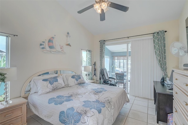 bedroom with ceiling fan, multiple windows, light tile flooring, and lofted ceiling