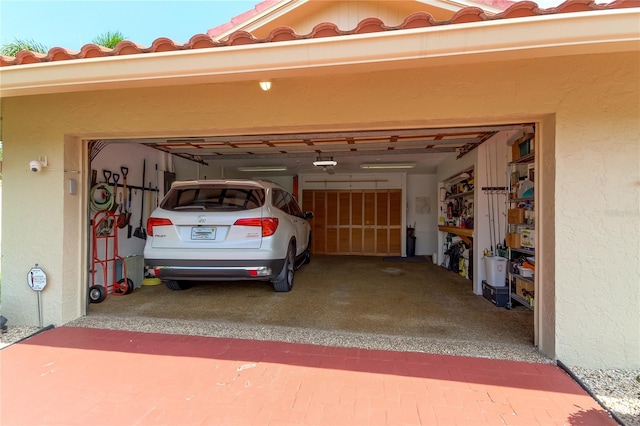 garage featuring a garage door opener