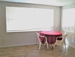 dining area featuring hardwood / wood-style floors