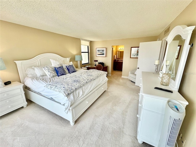 carpeted bedroom with a textured ceiling