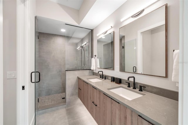 bathroom with vanity, tile patterned floors, and walk in shower