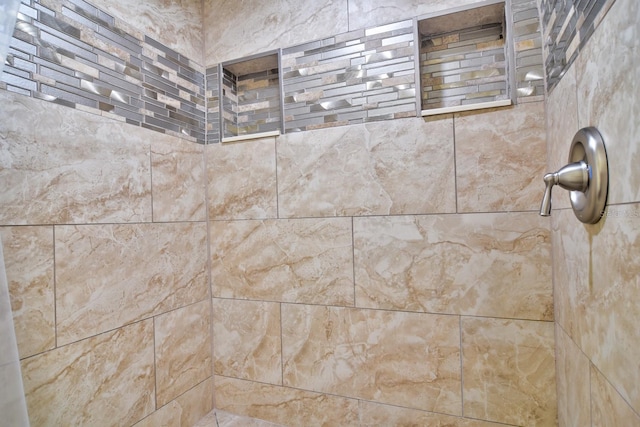 details with a tile shower