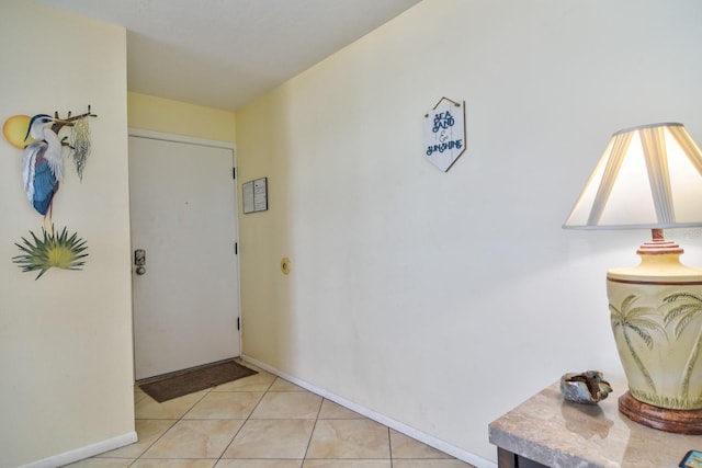 interior space with light tile patterned floors