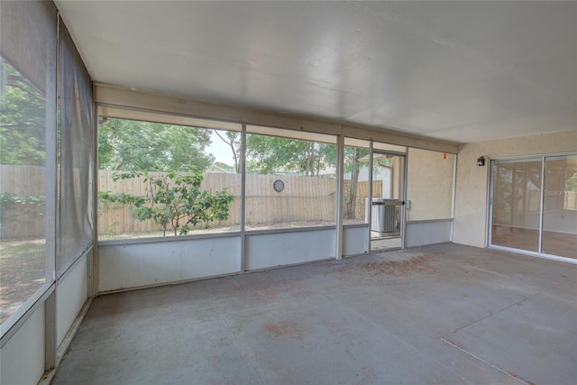 unfurnished sunroom with plenty of natural light