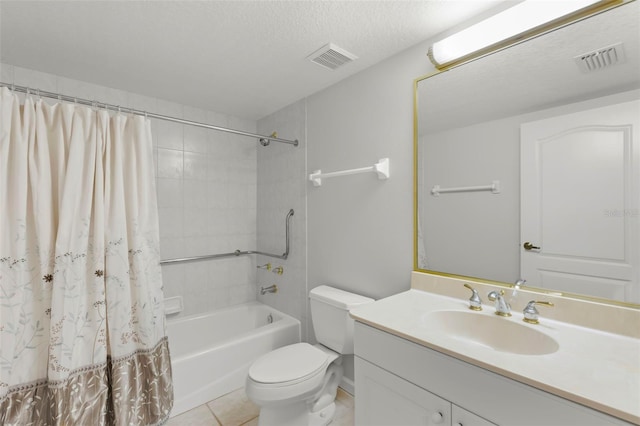 full bathroom featuring shower / tub combo, a textured ceiling, tile floors, toilet, and vanity