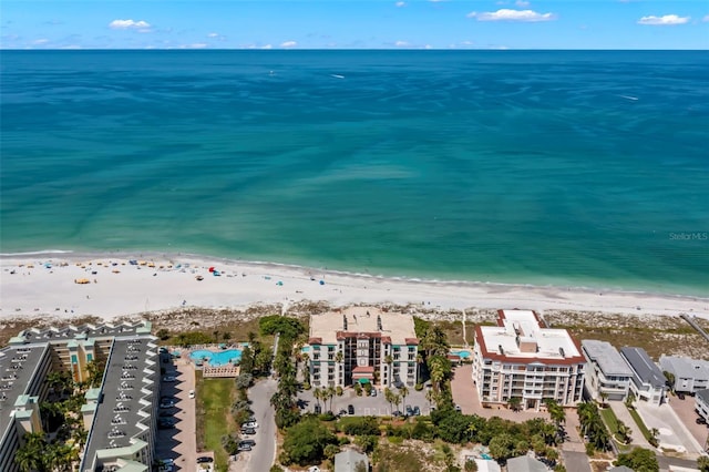 bird's eye view with a beach view and a water view