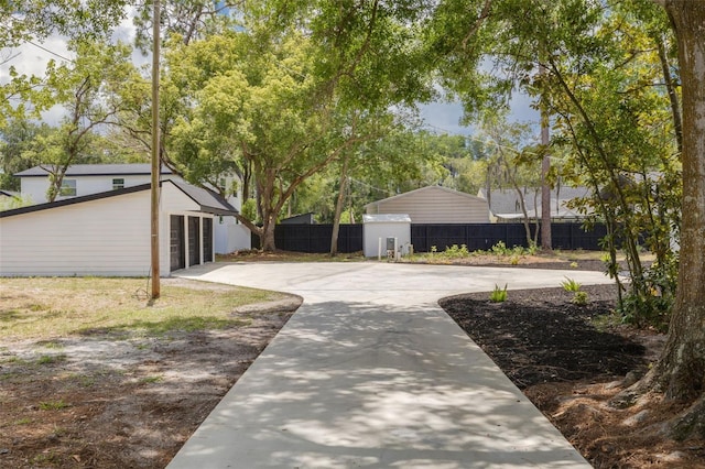 view of yard with a garage