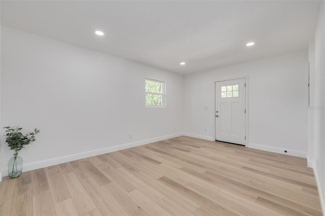 7414 Van Dyke Rd, Odessa, FL 33556 - entryway with light wood finished floors, baseboards, and recessed lighting