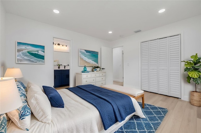 7414 Van Dyke Rd, Odessa, FL 33556 - bedroom featuring light wood-style flooring, a closet, recessed lighting, and connected bathroom