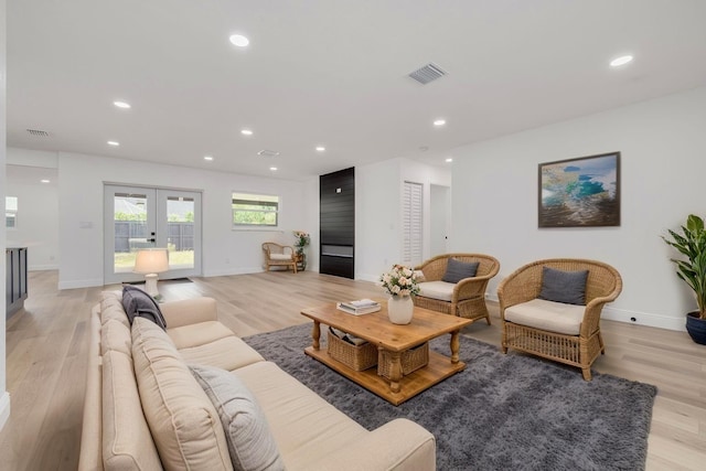 7414 Van Dyke Rd, Odessa, FL 33556 - living room featuring french doors, light wood-style floors, recessed lighting, and baseboards