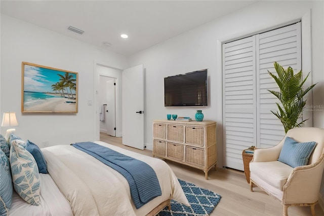 7414 Van Dyke Rd, Odessa, FL 33556 - bedroom featuring light wood finished floors, recessed lighting, and a closet