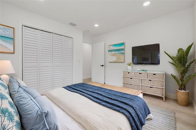 7414 Van Dyke Rd, Odessa, FL 33556 - bedroom with recessed lighting, a closet, baseboards, and light wood-style flooring