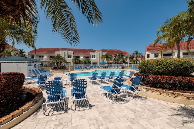 view of swimming pool with a patio area