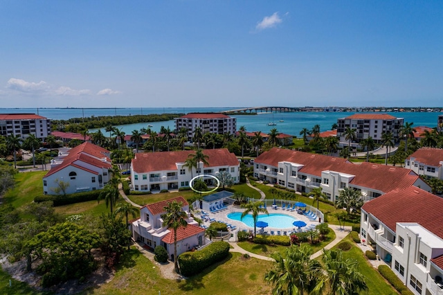 birds eye view of property featuring a water view