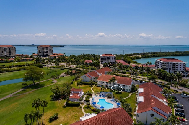 birds eye view of property with a water view