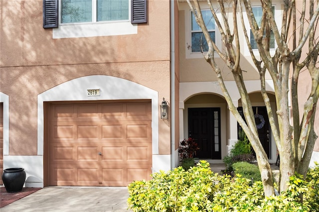 entrance to property with a garage