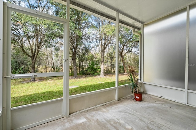 unfurnished sunroom with a wealth of natural light