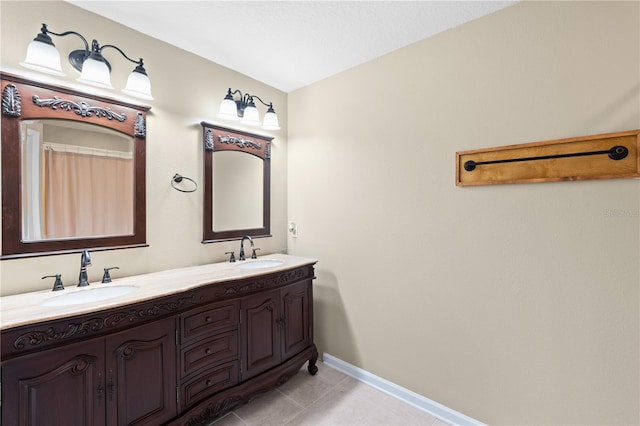 bathroom featuring double vanity and tile floors