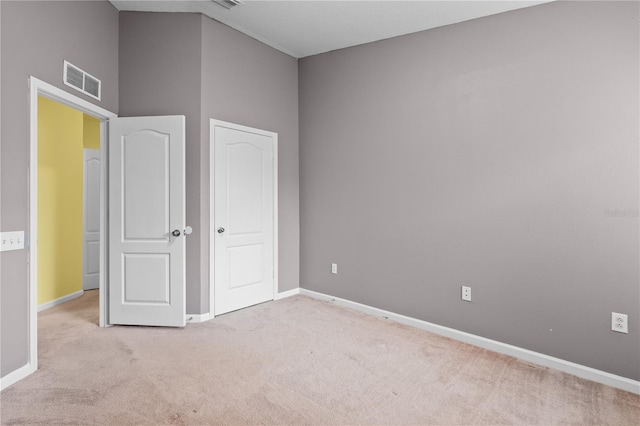 unfurnished bedroom featuring carpet floors