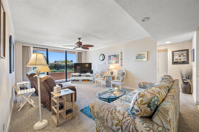 1 Key Capri Unit 104E, Treasure Island, FL 33706 - carpeted living room featuring a textured ceiling and a ceiling fan