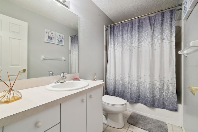 full bathroom with shower / bath combo, tile patterned floors, a textured ceiling, toilet, and vanity