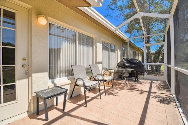 sunroom / solarium with a wealth of natural light and vaulted ceiling