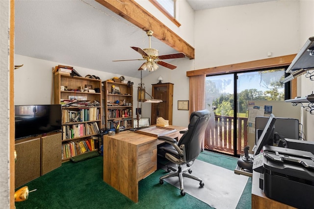 home office featuring ceiling fan, dark carpet, and high vaulted ceiling