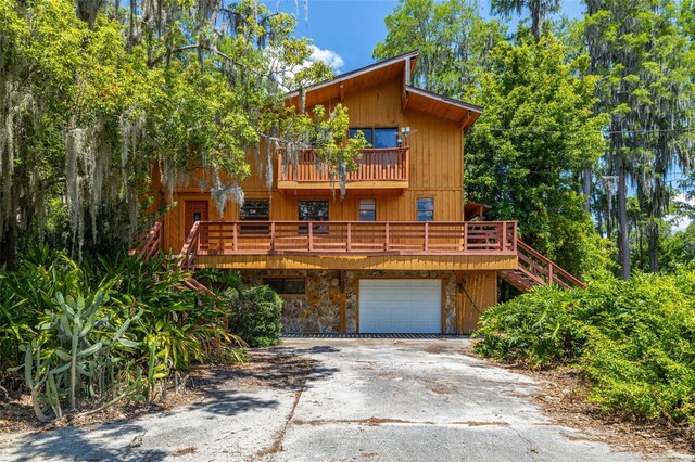 view of front of property with a garage