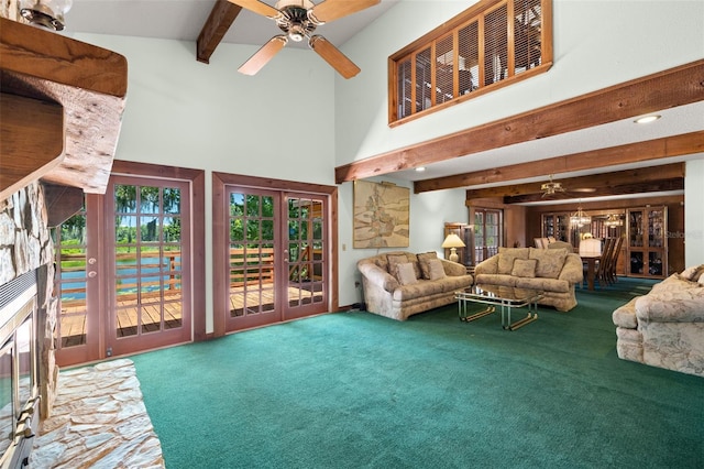 living room featuring beam ceiling, ceiling fan, and carpet floors