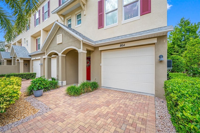 view of front of property with a garage