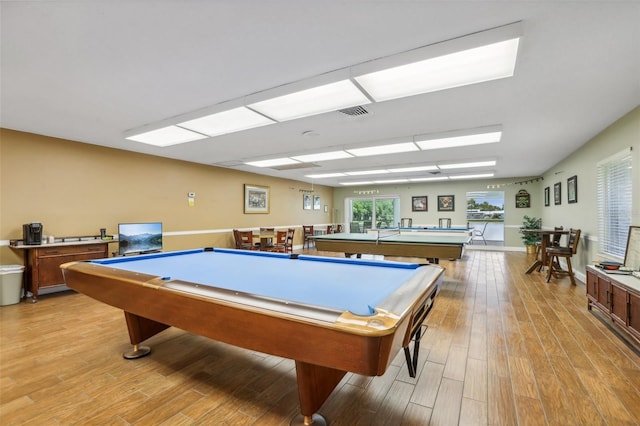 recreation room featuring billiards and light hardwood / wood-style flooring