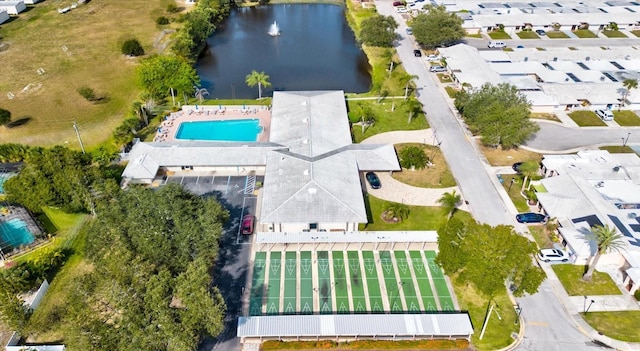 drone / aerial view with a water view