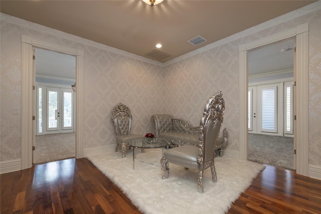 unfurnished room featuring french doors, dark hardwood / wood-style flooring, and crown molding