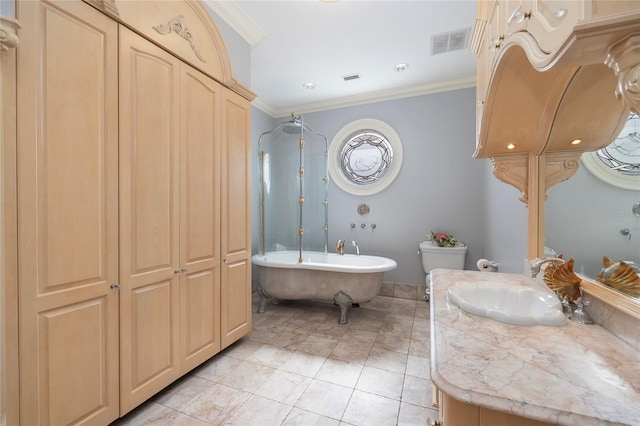 full bathroom with tile patterned floors, vanity, separate shower and tub, crown molding, and toilet