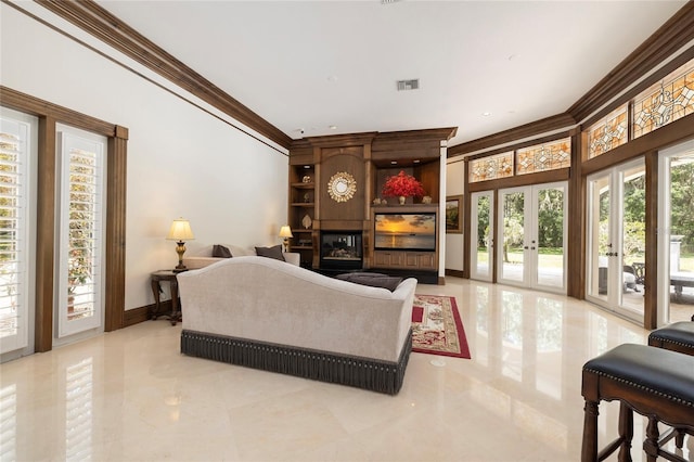 living room featuring ornamental molding and french doors