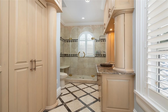 full bath with a stall shower, decorative columns, toilet, crown molding, and recessed lighting