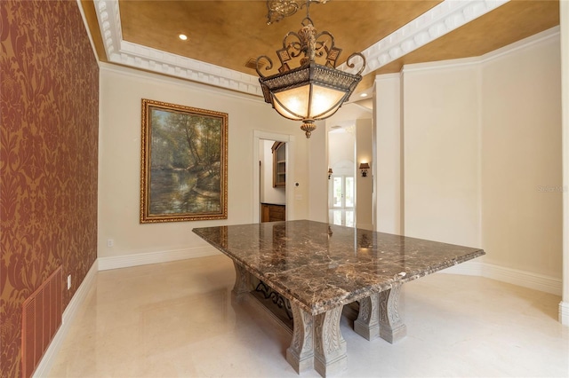 dining room with recessed lighting, a raised ceiling, and baseboards