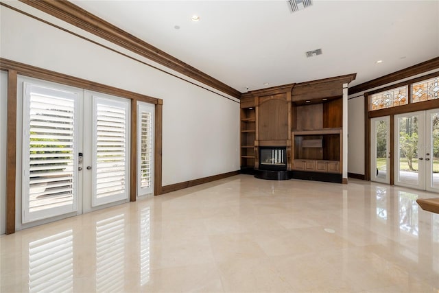 unfurnished living room with ornamental molding, french doors, visible vents, and baseboards