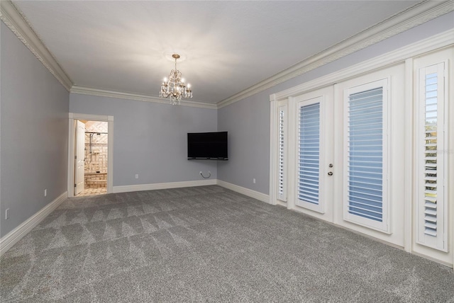 unfurnished living room with baseboards, ornamental molding, an inviting chandelier, french doors, and carpet floors