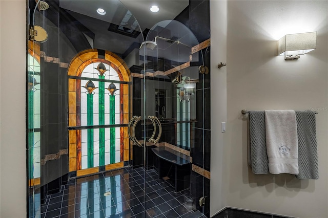 bathroom featuring a shower stall and tile patterned floors