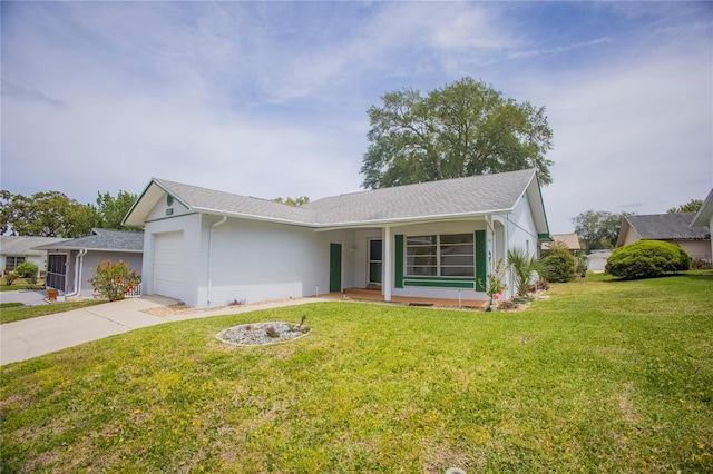 ranch-style home with a front lawn and a garage