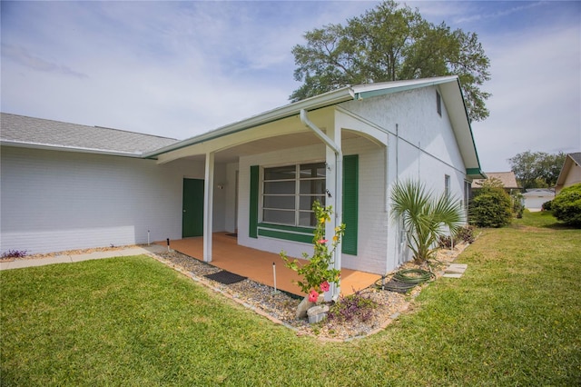 exterior space featuring a front yard