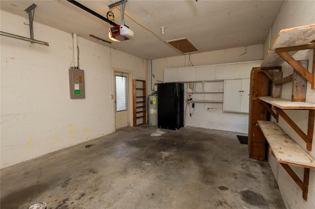 garage featuring electric water heater, a garage door opener, black fridge, and a workshop area