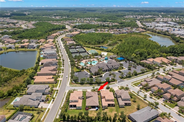 birds eye view of property featuring a water view