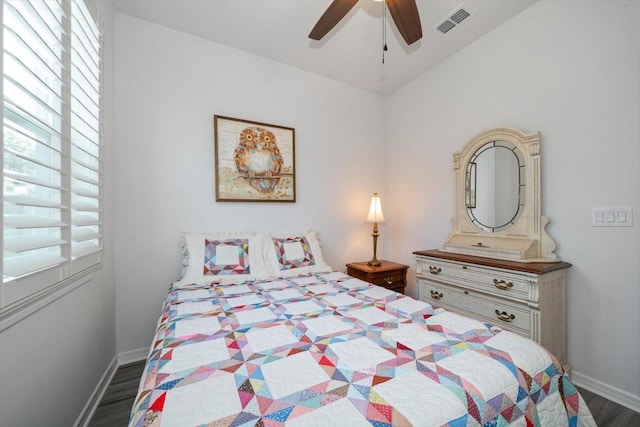 bedroom featuring dark wood-type flooring and ceiling fan