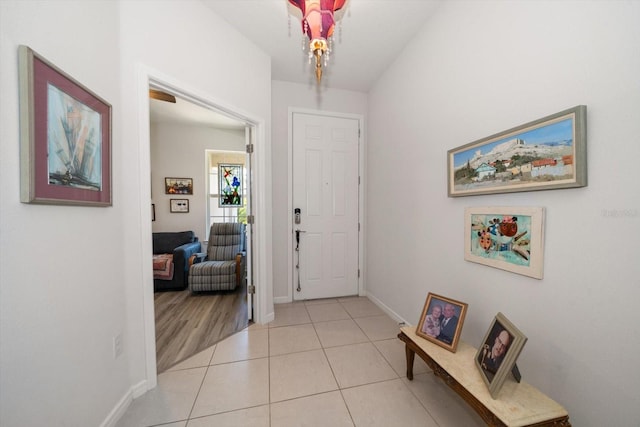 foyer entrance with light wood-type flooring